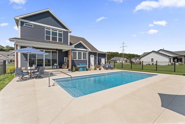 30860 Villa Dr, Granger, IN 46530 - view of swimming pool with a patio area and a grill