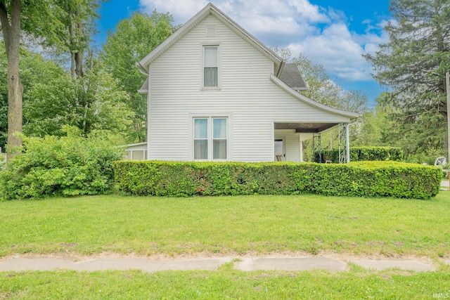 20 E Little St, Denver, IN 46926 - rear view of house with a yard