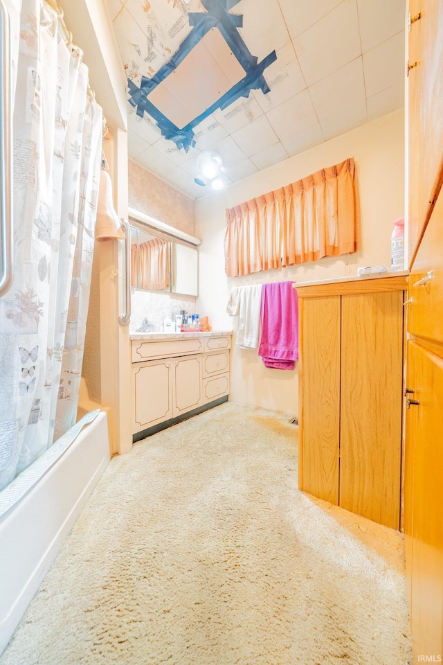 20 E Little St, Denver, IN 46926 - bathroom with shower / bath combo with shower curtain, vanity, and carpet
