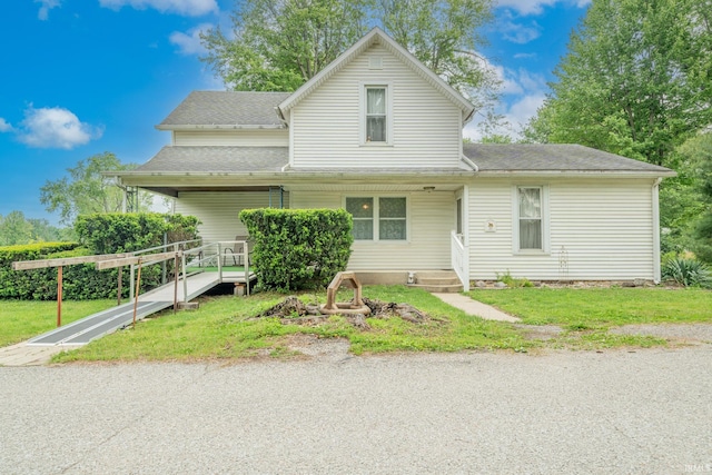 20 E Little St, Denver, IN 46926 - traditional-style house featuring covered porch, a front lawn, and roof with shingles