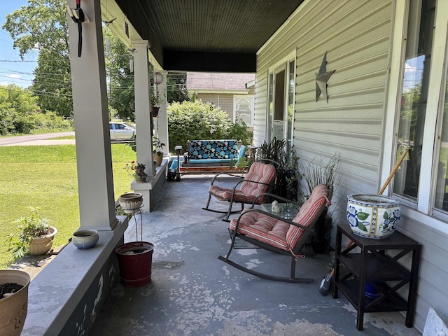 451 Miller Ave, Clarksville, IN 47129 - covered porch featuring a yard