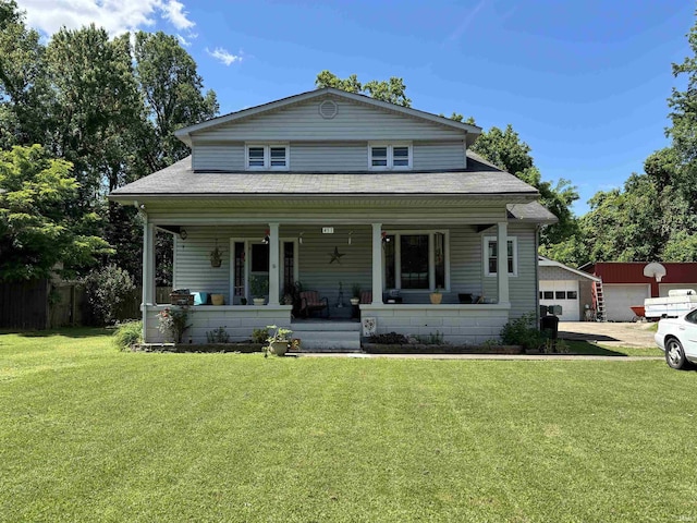 451 Miller Ave, Clarksville, IN 47129 - bungalow-style home with a porch, a shingled roof, a detached garage, and an outdoor structure