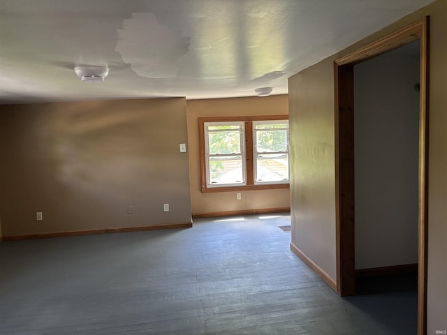 451 Miller Ave, Clarksville, IN 47129 - spare room featuring baseboards and wood finished floors