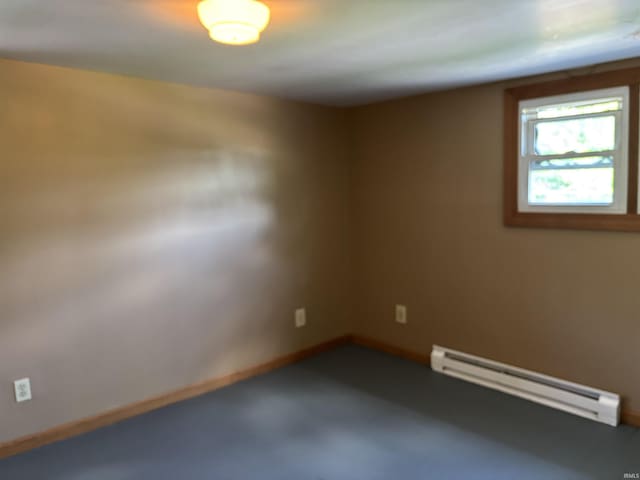451 Miller Ave, Clarksville, IN 47129 - spare room featuring a baseboard heating unit and baseboards