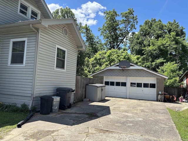 451 Miller Ave, Clarksville, IN 47129 - view of home's exterior with a detached garage and an outbuilding