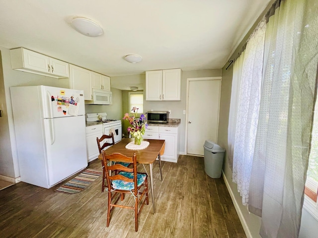 1206 N Walnut St, Plymouth, IN 46563 - kitchen with white appliances, dark wood-style floors, white cabinetry, and light countertops
