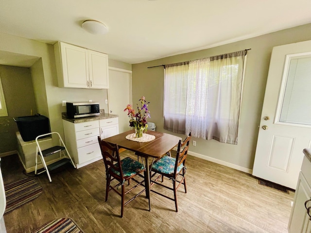 1206 N Walnut St, Plymouth, IN 46563 - dining space with wood finished floors and baseboards