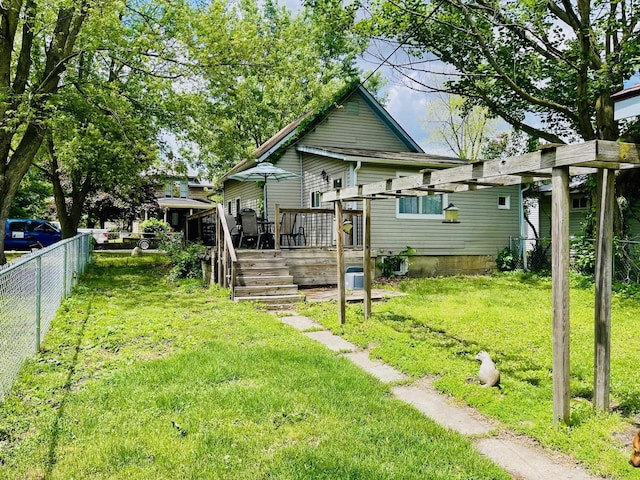 1206 N Walnut St, Plymouth, IN 46563 - rear view of property featuring a wooden deck