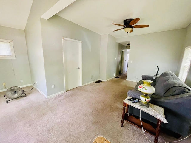 1206 N Walnut St, Plymouth, IN 46563 - living room with a ceiling fan, baseboards, and carpet flooring