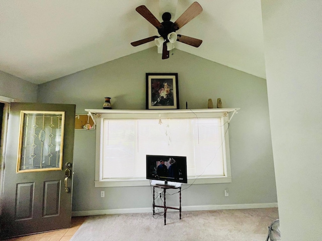 1206 N Walnut St, Plymouth, IN 46563 - foyer entrance with vaulted ceiling, a ceiling fan, plenty of natural light, carpet flooring, and baseboards