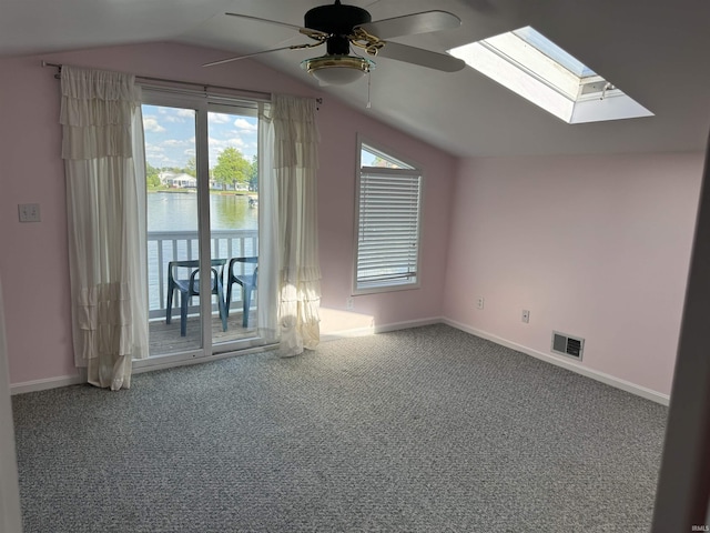 2109 Ball Ct, Rochester, IN 46975 - bonus room featuring lofted ceiling, a ceiling fan, baseboards, carpet, and a skylight