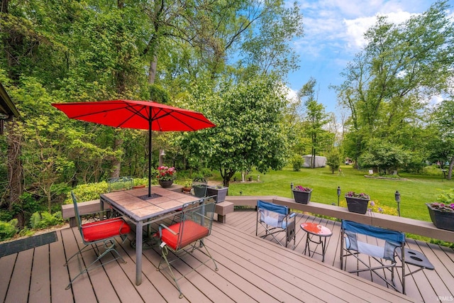 21485 Wallen Dr, South Bend, IN 46628 - wooden terrace featuring outdoor dining area and a lawn