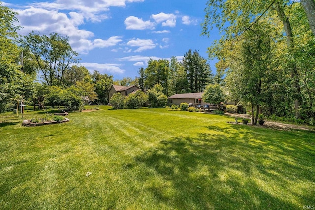 21485 Wallen Dr, South Bend, IN 46628 - view of grassy yard featuring view of scattered trees