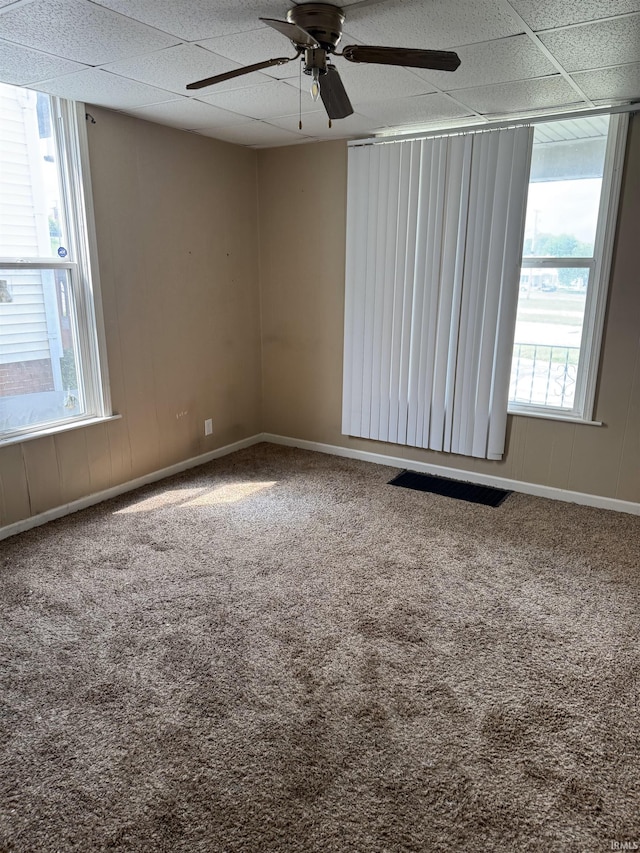 2606 Pennsylvania St, Evansville, IN 47712 - carpeted spare room with a ceiling fan, baseboards, and a paneled ceiling