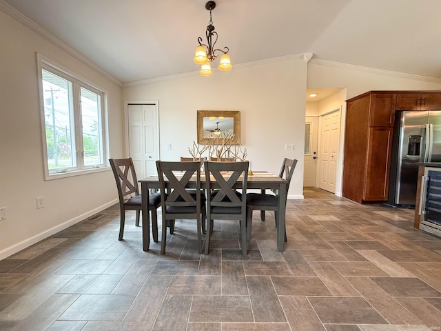 22073 County Road 10 W, Elkhart, IN 46514 - dining space with baseboards, ornamental molding, a chandelier, vaulted ceiling, and wine cooler