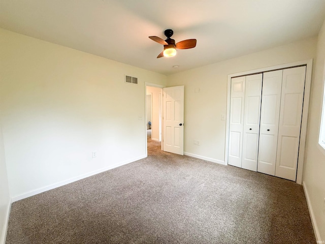 22073 County Road 10 W, Elkhart, IN 46514 - unfurnished bedroom featuring carpet, baseboards, a closet, and ceiling fan