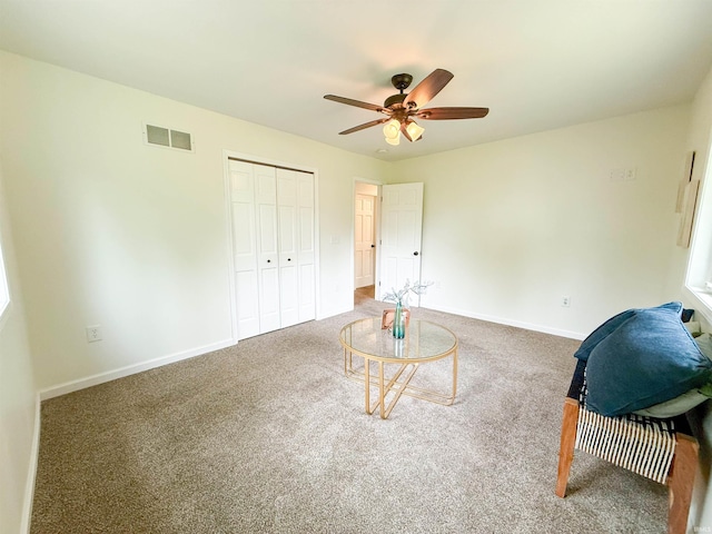 22073 County Road 10 W, Elkhart, IN 46514 - sitting room featuring ceiling fan, carpet flooring, and baseboards