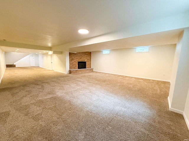 22073 County Road 10 W, Elkhart, IN 46514 - below grade area featuring carpet flooring, baseboards, and a fireplace