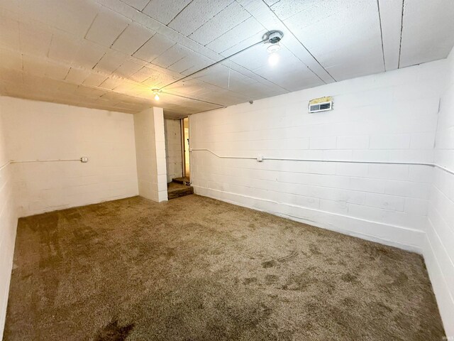 22073 County Road 10 W, Elkhart, IN 46514 - finished basement with carpet flooring and concrete block wall