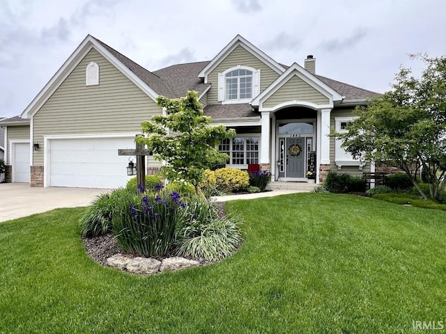 1442 Centerbrook Dr, New Haven, IN 46774 - view of front of home featuring a chimney, concrete driveway, a front lawn, and an attached garage