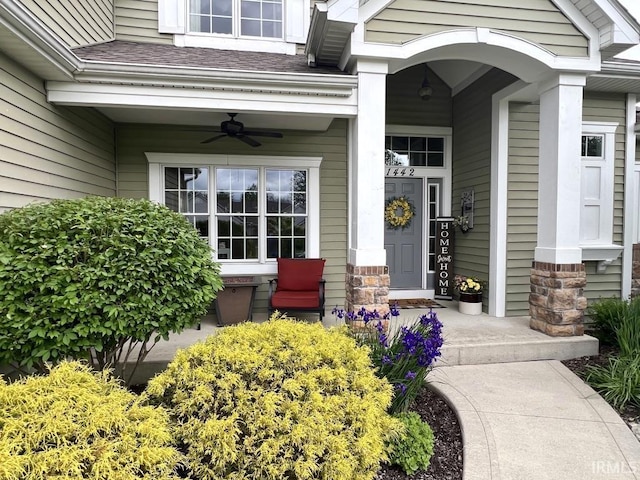 1442 Centerbrook Dr, New Haven, IN 46774 - doorway to property with covered porch, a ceiling fan, and roof with shingles