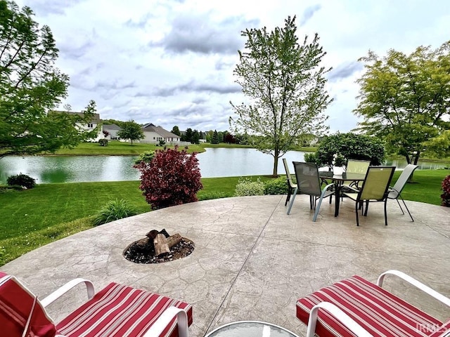 1442 Centerbrook Dr, New Haven, IN 46774 - view of patio / terrace featuring a fire pit, outdoor dining space, and a water view