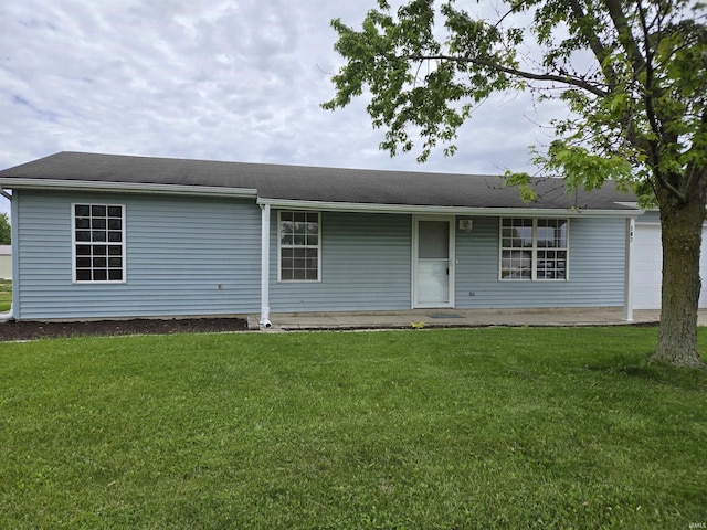 103 Adams Cts, Ashley, IN 46705 - ranch-style house featuring a front yard and a garage