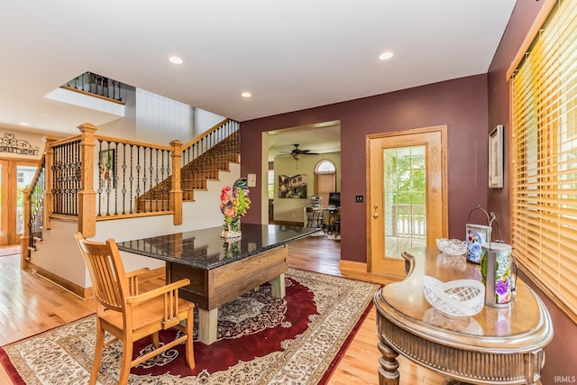 501 W Fox Lake Rd, Angola, IN 46730 - dining room featuring stairway, wood finished floors, recessed lighting, a ceiling fan, and baseboards