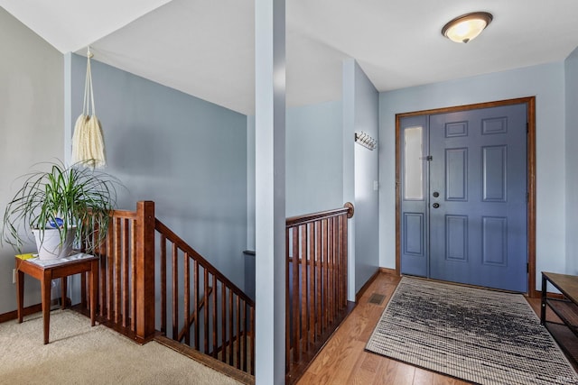 612 E Dunn Rd, New Carlisle, IN 46552 - foyer featuring wood finished floors and baseboards