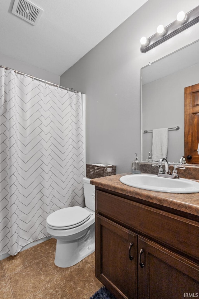 612 E Dunn Rd, New Carlisle, IN 46552 - full bath with vanity, toilet, tile patterned floors, and a shower with shower curtain