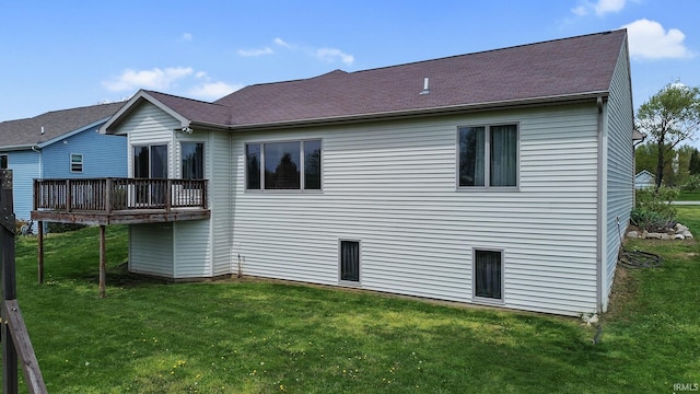 612 E Dunn Rd, New Carlisle, IN 46552 - back of property featuring a wooden deck and a lawn