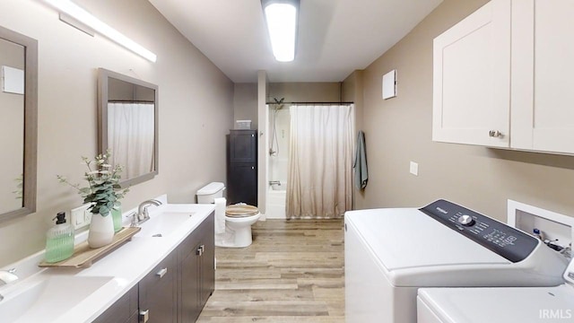 5480 S 950 W, South Whitley, IN 46787 - laundry area with separate washer and dryer and light wood-style flooring
