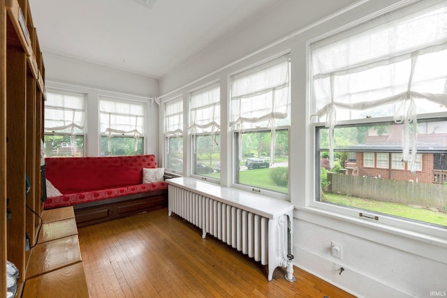 2215 Kensington Blvd, Fort Wayne, IN 46805 - sunroom / solarium with hardwood / wood-style flooring and radiator
