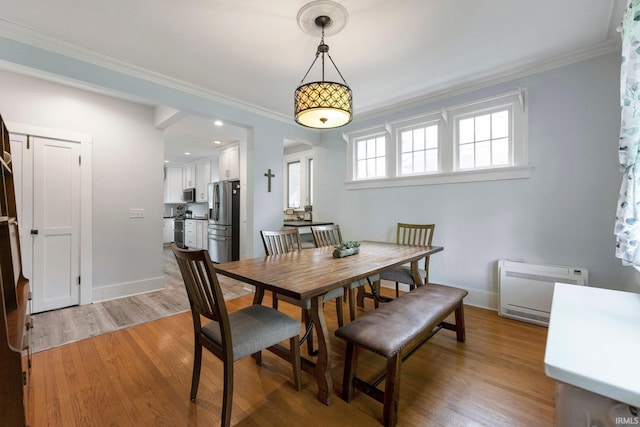 2215 Kensington Blvd, Fort Wayne, IN 46805 - dining room with ornamental molding, light wood-style floors, baseboards, and heating unit