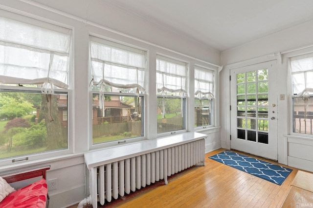 2215 Kensington Blvd, Fort Wayne, IN 46805 - sunroom / solarium featuring radiator and wood-type flooring