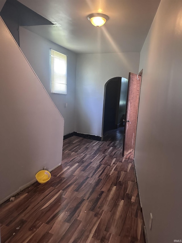 909 W Maryland St, Evansville, IN 47710 - unfurnished room with dark wood finished floors and baseboards