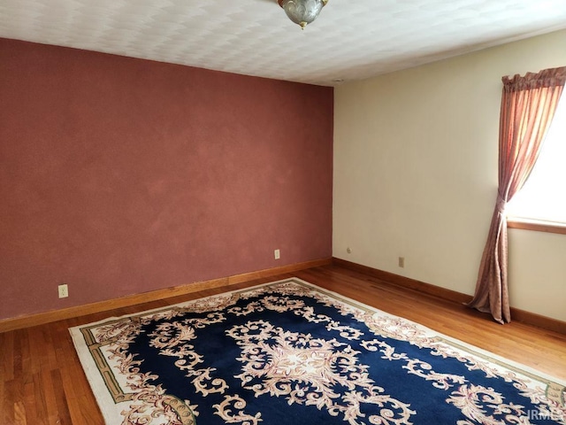 2790 E Cherry Ln, Marion, IN 46953 - unfurnished room with wood finished floors and baseboards