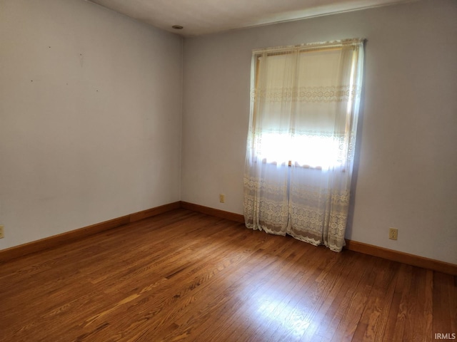 2790 E Cherry Ln, Marion, IN 46953 - spare room featuring wood finished floors and baseboards