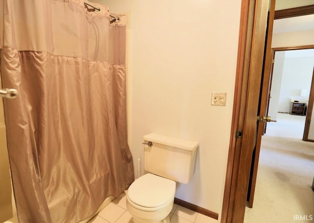 6322 Eagle Nest Ct, Fort Wayne, IN 46814 - full bathroom featuring toilet, a shower with curtain, baseboards, and tile patterned flooring