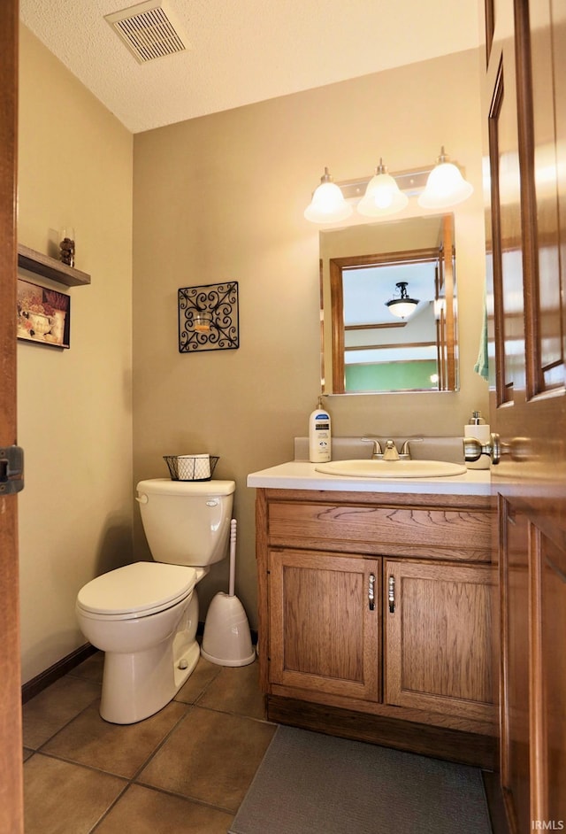 6322 Eagle Nest Ct, Fort Wayne, IN 46814 - half bath with vanity, toilet, and tile patterned flooring