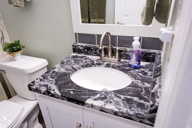 3850 W Woodmere Ct, Bloomington, IN 47403 - bathroom featuring toilet and vanity