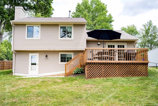 3850 W Woodmere Ct, Bloomington, IN 47403 - rear view of house featuring a chimney, a deck, stairs, and a shingled roof