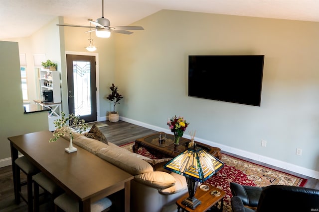 3850 W Woodmere Ct, Bloomington, IN 47403 - living area with lofted ceiling, a ceiling fan, wood finished floors, and baseboards