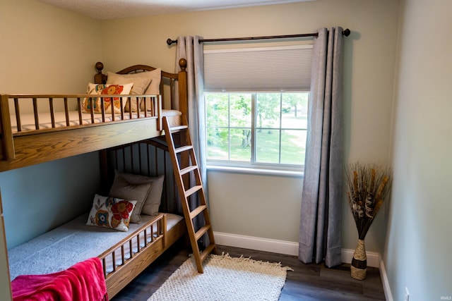 3850 W Woodmere Ct, Bloomington, IN 47403 - bedroom featuring wood finished floors and baseboards