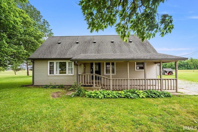 6659 W 400 S, Swayzee, IN 46986 - back of house featuring a lawn, covered porch, and roof with shingles