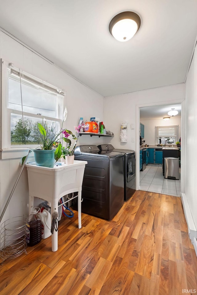 6659 W 400 S, Swayzee, IN 46986 - laundry area with separate washer and dryer and light wood-style flooring