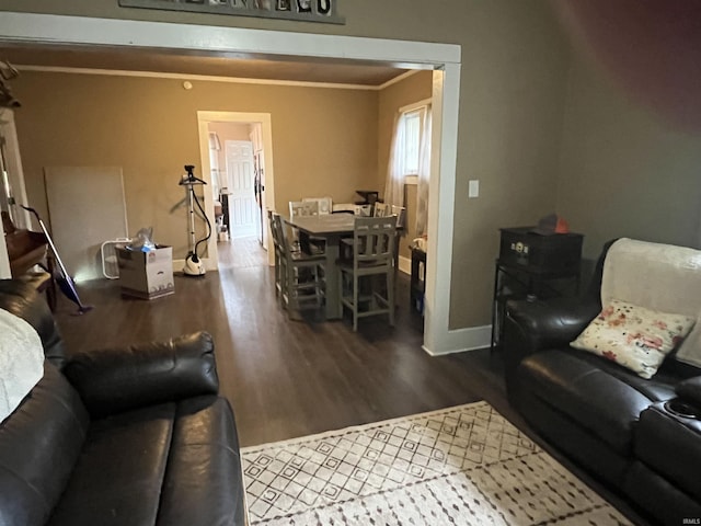 1746 College Ave, Huntington, IN 46750 - living area featuring wood finished floors, baseboards, and ornamental molding