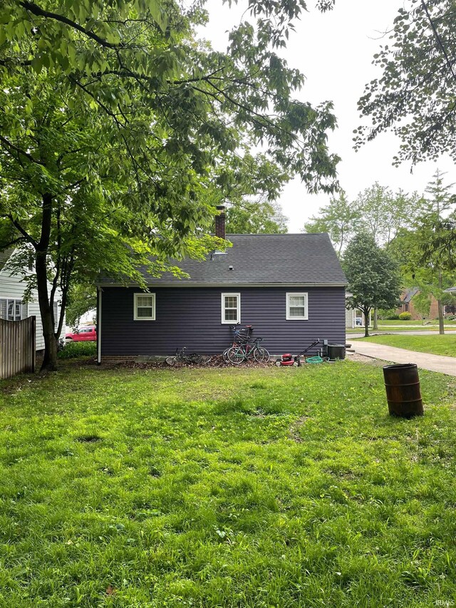 204 Dehart St, West Lafayette, IN 47906 - rear view of house with a chimney and cooling unit