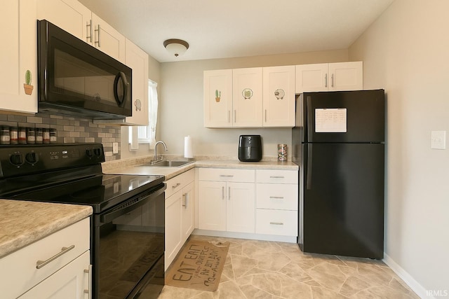 2014 N Macy Ln, Greensburg, IN 47240 - kitchen featuring black appliances, white cabinetry, light countertops, and a sink