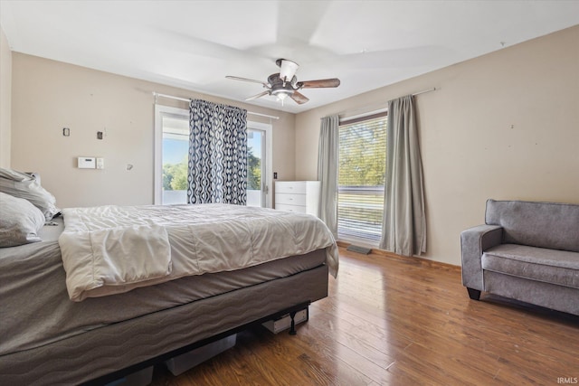 16828 Barryknoll Way, Granger, IN 46530 - bedroom featuring access to exterior, wood finished floors, and ceiling fan
